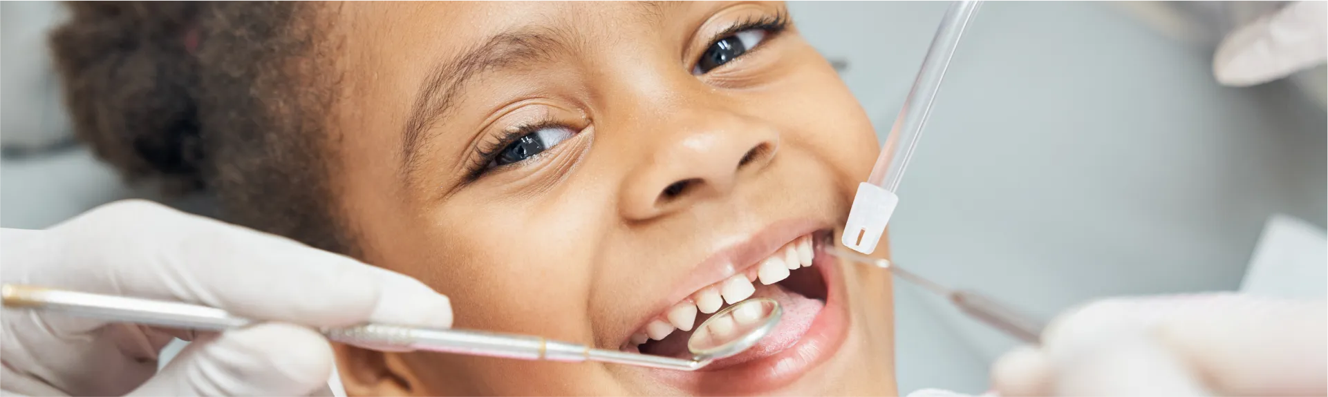 Smiling kid at dentist office.